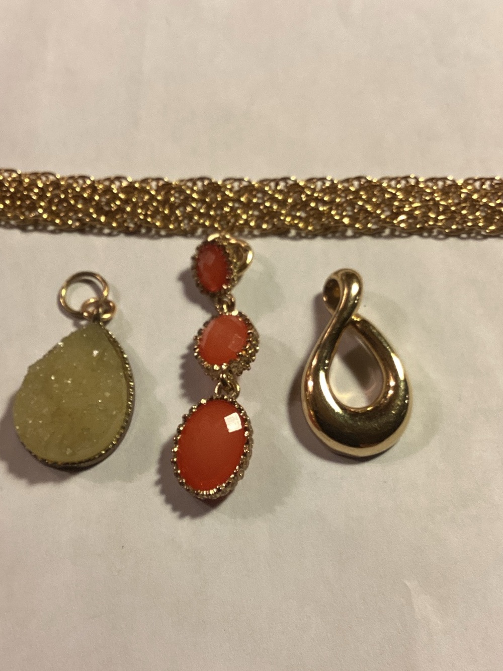 Interchangeable pendants (3) with gold tone chain